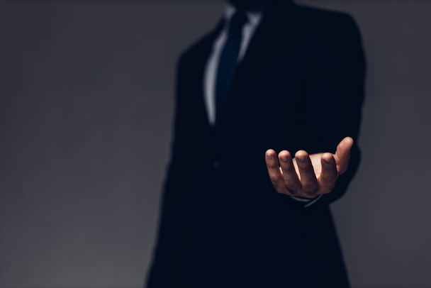 Businessman with empty hand. Business hand a palm up gesture on a background. Businessman showing empty hand and presenting with hand empty - Foto, Imagem