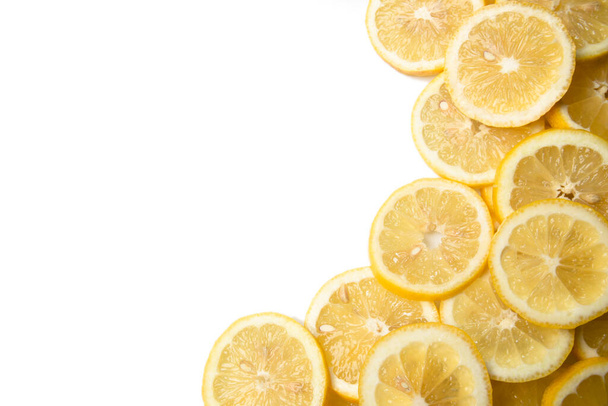 overlapping lemon slices on white background with copy space - Φωτογραφία, εικόνα