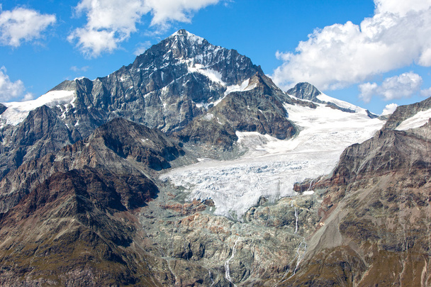 Alpine glacier melting in the Swiss Alps - Foto, afbeelding