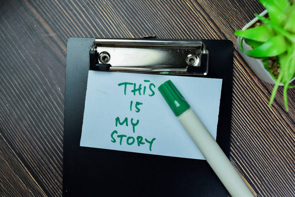 Concept of This is My Story write on sticky notes isolated on Wooden Table. - Photo, Image
