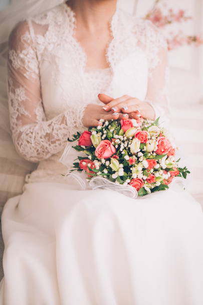 Beautiful wedding bouquet in hands of the bride - Valokuva, kuva