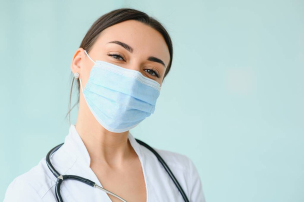 portrait of female doctor wearing protective mask - Photo, image