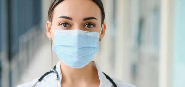 portrait of female doctor wearing protective mask - Photo, image