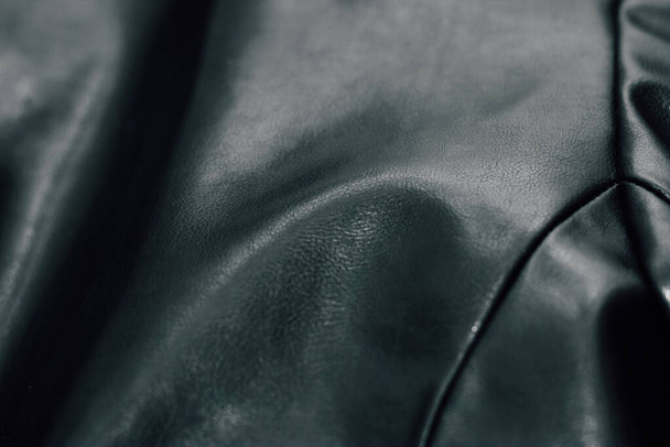 Black texture eco soft leather, fashionable jacket. - Photo, image