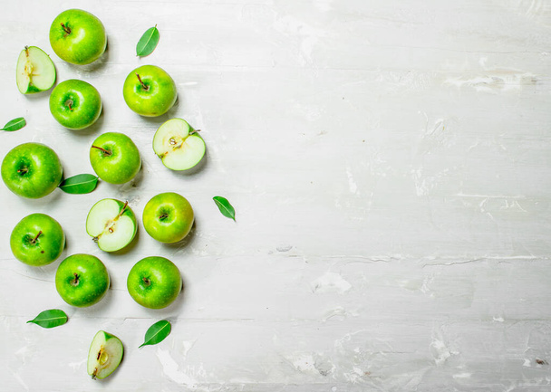 Green fresh apples. On white rustic background . - Fotoğraf, Görsel