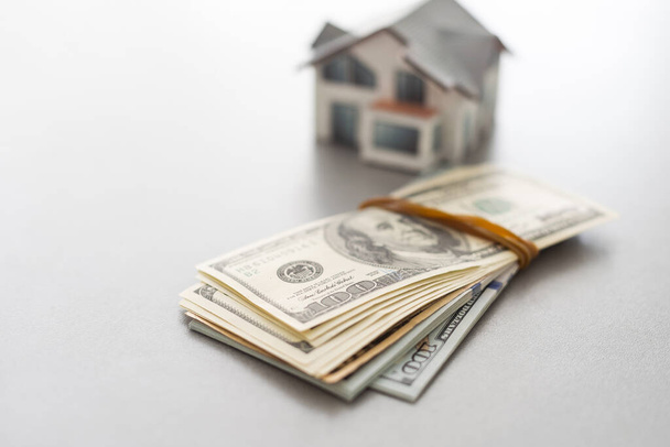 Investment, model house and money. - Φωτογραφία, εικόνα