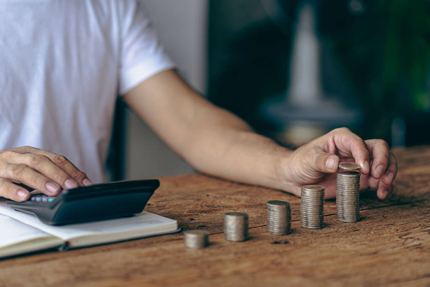 Concepts of financial accounting management in the future, income and expenses, savings and investment management concepts. Key things to consider when planning with stacks of coins - Valokuva, kuva