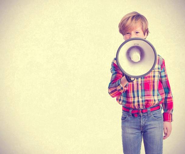 Vexed child with a megaphone - Photo, image