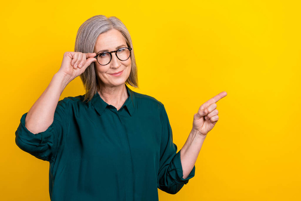 Photo of manager promoter lady point finger empty space eyesight checkup advert isolated bright color background. - Fotoğraf, Görsel