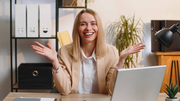 Happy amazed young businesswoman working on laptop shocked by sudden victory, game winning, lottery goal achievemen, good career news. Excited manager woman freelancer at home office workplace desk - Photo, image