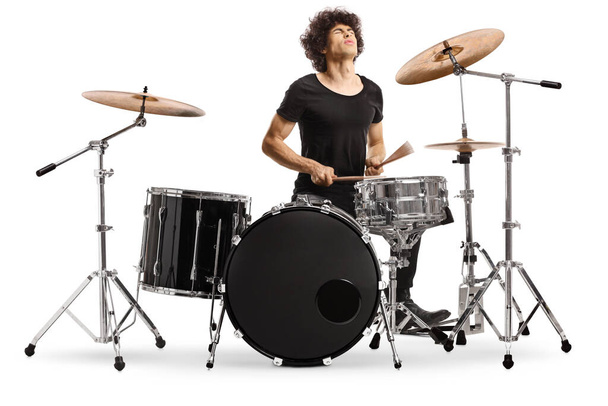 Male performer playing drums isolated on white background - Foto, imagen