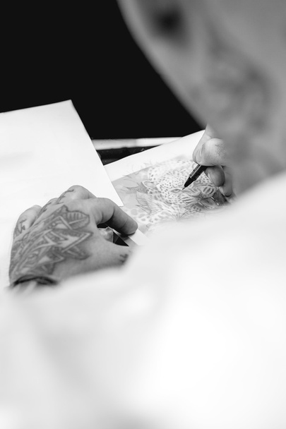 tattoo artist drawin - Photo, Image