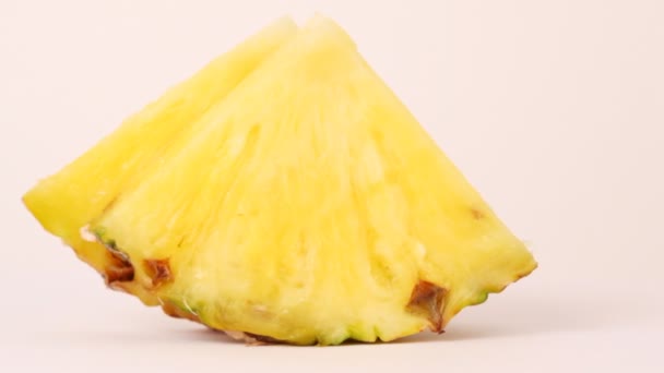 Pineapple slice isolated on white - Video, Çekim
