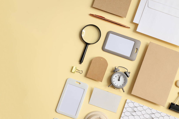 Mockup flat lay with different office accessories on beige background - Photo, Image