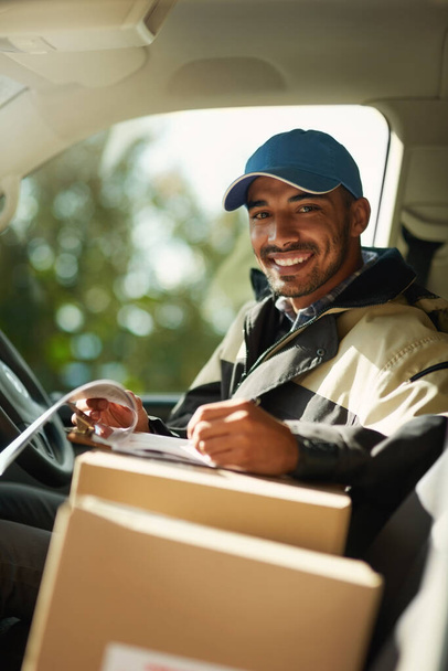 Writing, delivery and checklist with portrait of man in van for courier, logistics and shipping. Ecommerce, export and distribution with male postman in vehicle for mail, package and cargo shipment. - Photo, Image