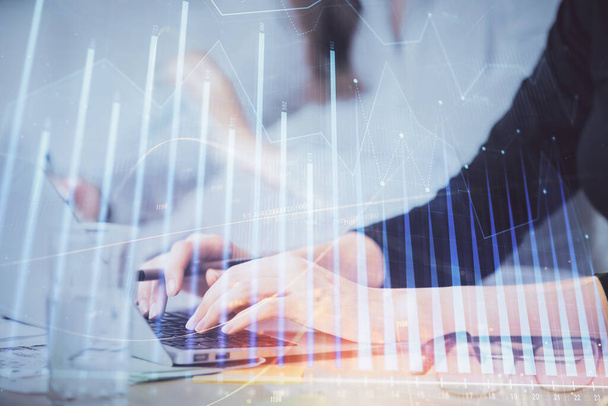 Multi exposure of woman hands typing on computer and financial graph hologram drawing. Stock market analysis concept. - Foto, Imagen