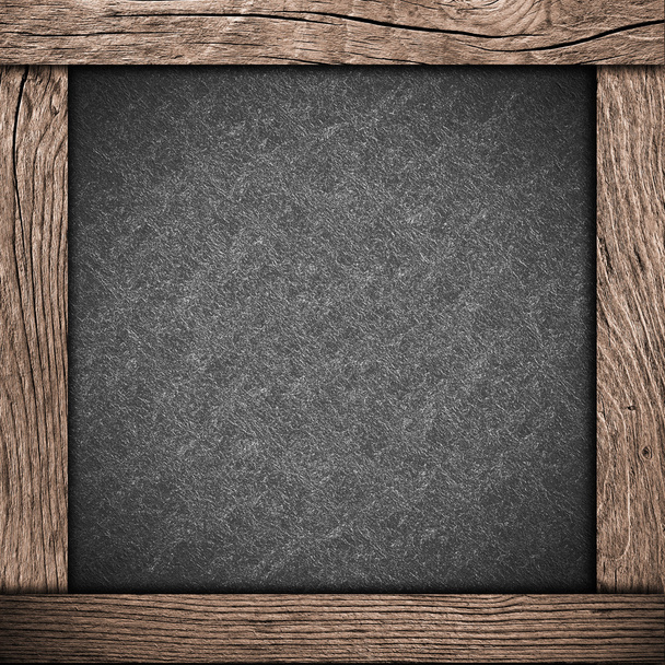 marco de madera con papel oscuro
 - Foto, imagen