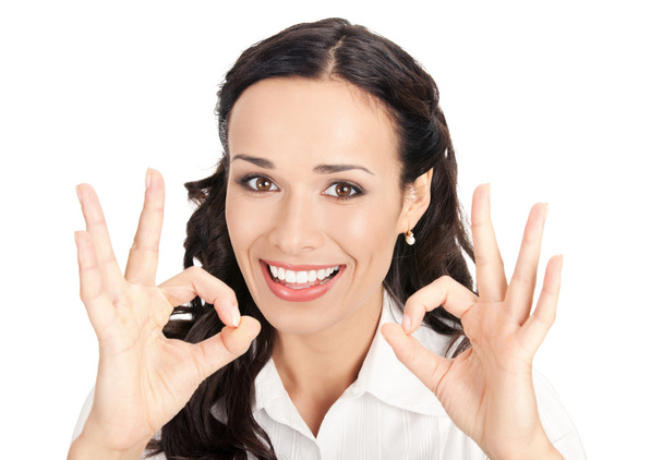Business woman with okay gesture, on white - Фото, изображение