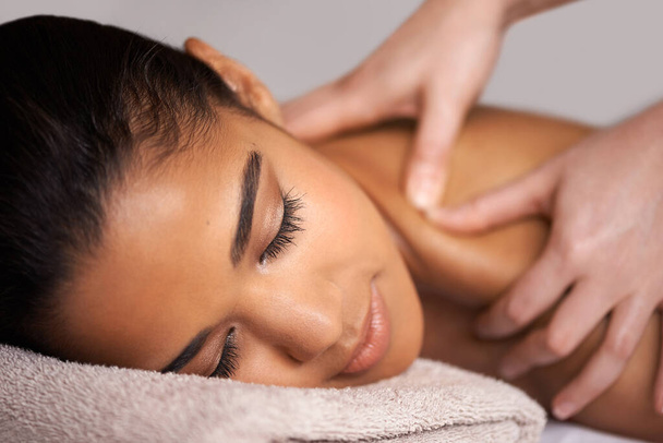 Girl, sleep or hands for massage in spa to relax for zen resting, wellness or luxury physical therapy. Spine or face of woman in salon for body healing, sleeping or natural holistic detox by masseuse. - Photo, Image