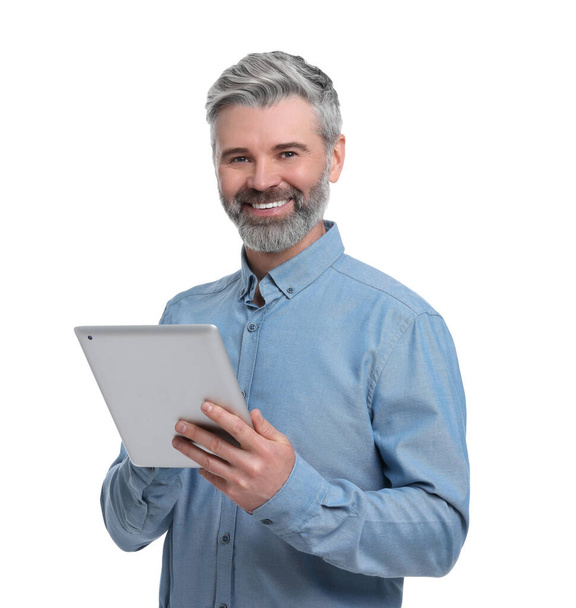 Mature businessman in stylish clothes with tablet on white background - Fotó, kép