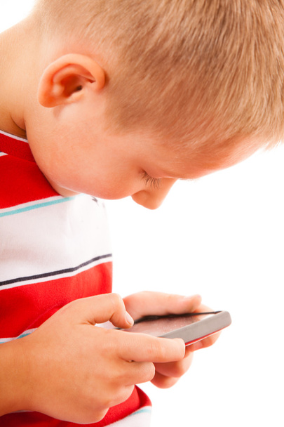 Little boy playing on smartphone - Фото, зображення
