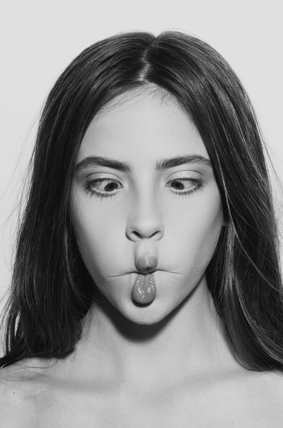 Lips fun. Funny woman face close up. Crazy girl studio portrait - Foto, afbeelding