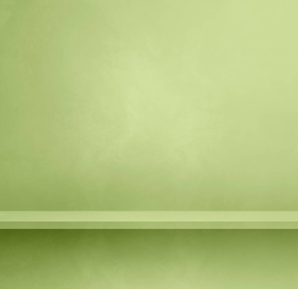 Empty shelf on a light green concrete wall. Background template scene. Square mockup - Photo, image