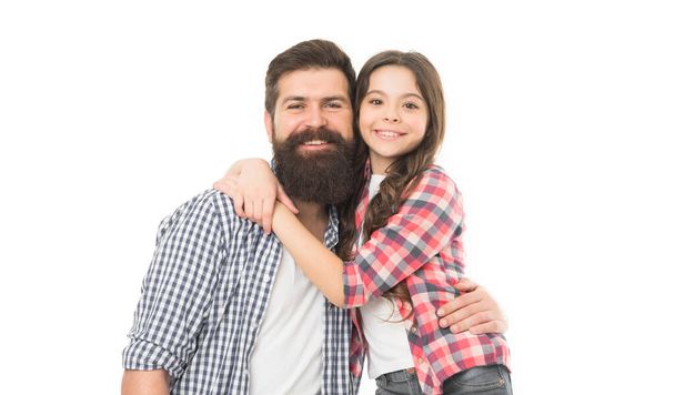Taking care of their hair. Father and daughter in hair salon. Little girl with long brunette hair hugging bearded man. Hipster with beard and mustache hair and adorable small child. - Photo, Image