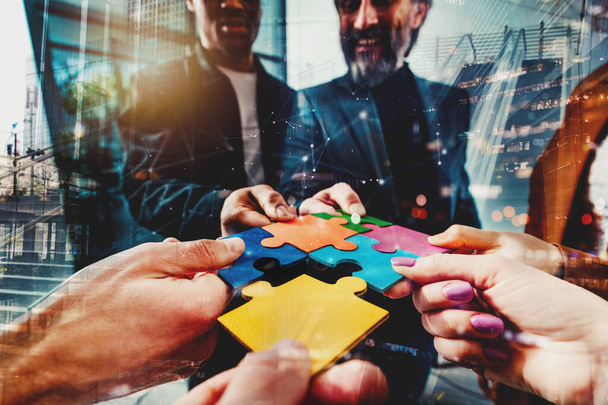 Business people connect puzzle pieces as integration and startup - Photo, Image