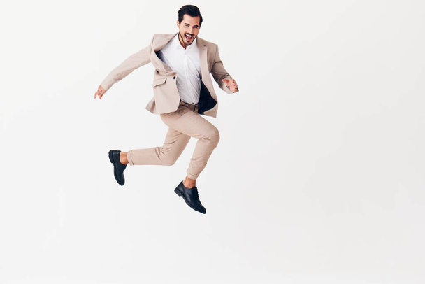 liikemies työ henkilö studio beige ammatillinen hyppääminen voitto uros käynnissä menestys hymyilevä tausta voittaja silmälasien ammatti puku onnellinen liikemies ylös - Valokuva, kuva