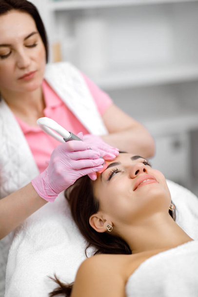 Blackhead removal, Cosmetology service, Rejuvenation treatment dermatological service - Photo, Image