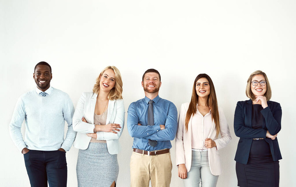 Law portrait, smile and teamwork of business people by white wall background mockup in workplace. Face, confident group and lawyers standing together with arms crossed, diversity and collaboration - Fotoğraf, Görsel