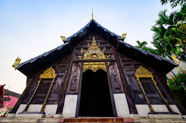 Ancient Wooden Church in Wat Phan Tao, Chiang Mai Province. - 写真・画像
