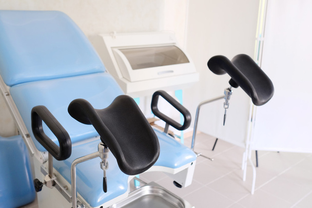 Blue gynecological chair - Фото, зображення