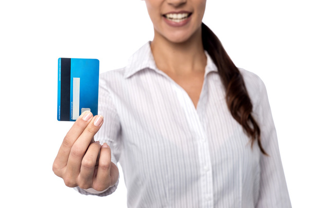 Woman showing debit card - Foto, Imagen