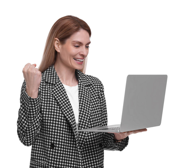 Beautiful happy businesswoman with laptop on white background - Fotoğraf, Görsel