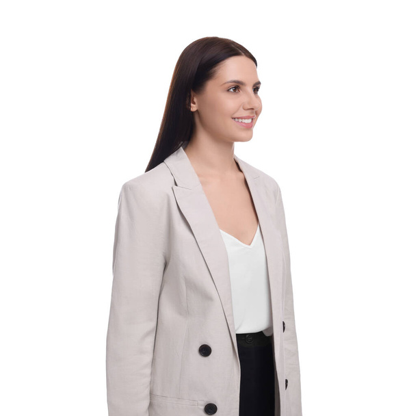 Beautiful young businesswoman in suit on white background - Photo, image