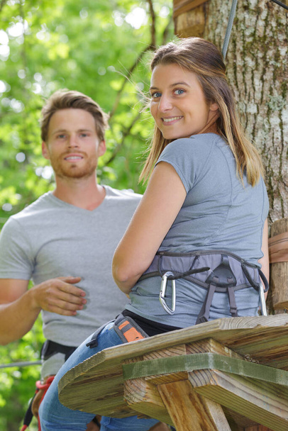 couple in an outdoor adventure park - 写真・画像
