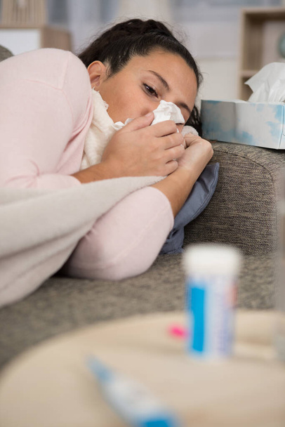 sick woman with flu lying in bed - Фото, зображення