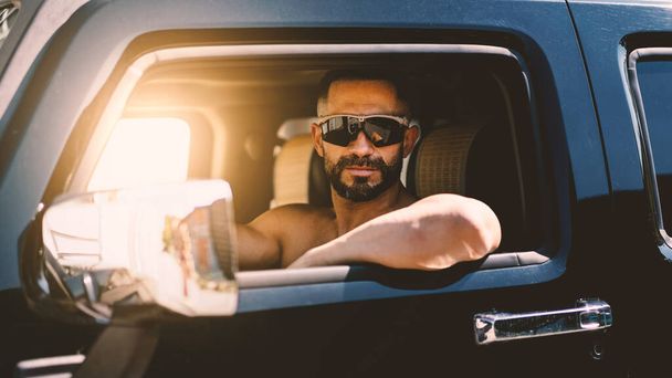 Young casual man confident portrait inside car. Lifestyle. - Photo, Image