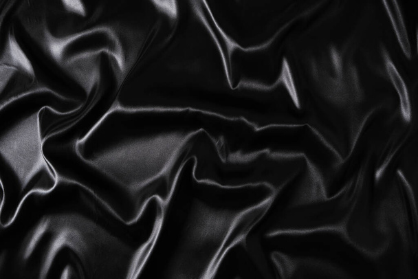 Silk fabric, abstract wavy black satin fabric background - Foto, Imagem