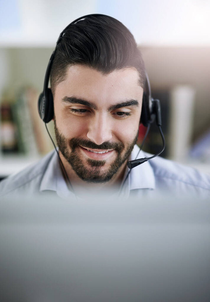 Communication, face or happy man in call center consulting, speaking or talking at customer services. Virtual assistant, friendly or sales consultant in telemarketing or telecom company help desk. - Foto, Imagem
