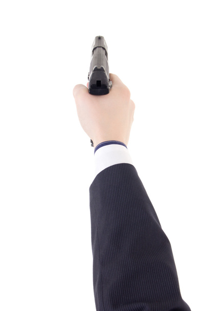 męskiej ręki w garniturze gospodarstwa pistolet na białym tle - Zdjęcie, obraz