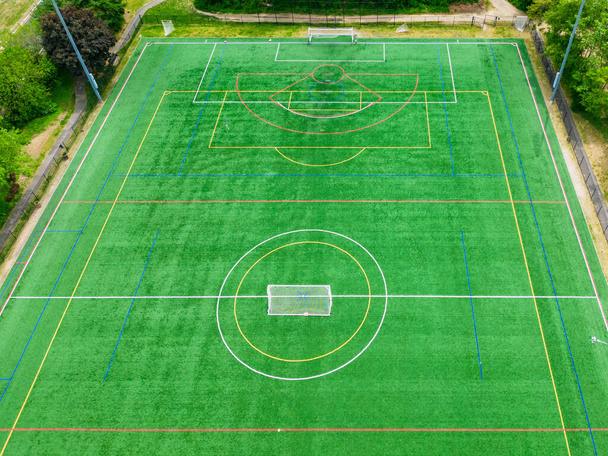 Overhead aerial view of soccer field with turf and lines - Fotoğraf, Görsel