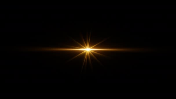 Silmukka keskus pyörivä hehku kulta pitkävartinen tähti säteet valot optinen linssi soihdut kiiltävä animaatio taidetta musta abstrakti tausta näytön projektin overlay. Valaistus valonsäteet vaikutus dynaaminen kirkas videomateriaalia. Kulta hehku tähti  - Materiaali, video