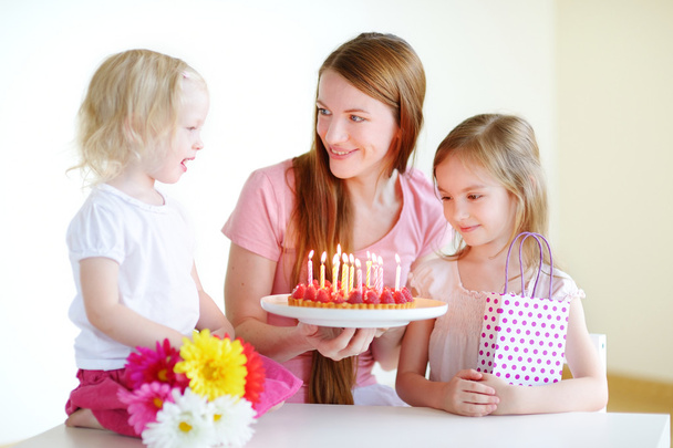 Daughters and mom with birthday cake - Fotoğraf, Görsel