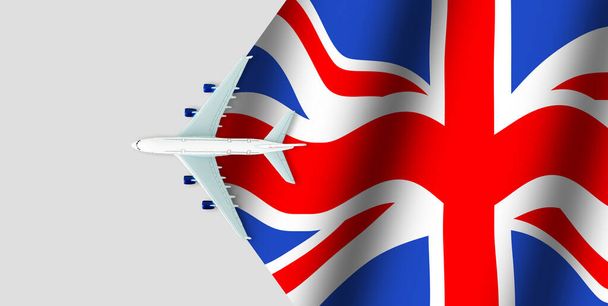 Letadlo nad vlajkou Velké Británie, pojetí cestování. Hračka letadlo, Turistika a cestování. - Fotografie, Obrázek