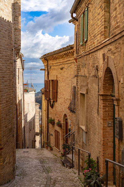 Narrow street in Ripatransone small village. Marche region, Italy. - Fotó, kép