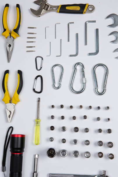 Set of tools for repair in a case on a white background. Assorted work or construction tools. Wrenches, Pliers, screwdriver. Top view - Foto, Imagem