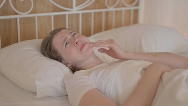 Young Woman with Toothache Lying in Bed - Photo, Image